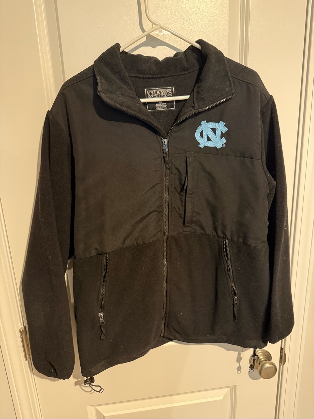 Champs Black Performance Jacket with Light Blue UNC Logo